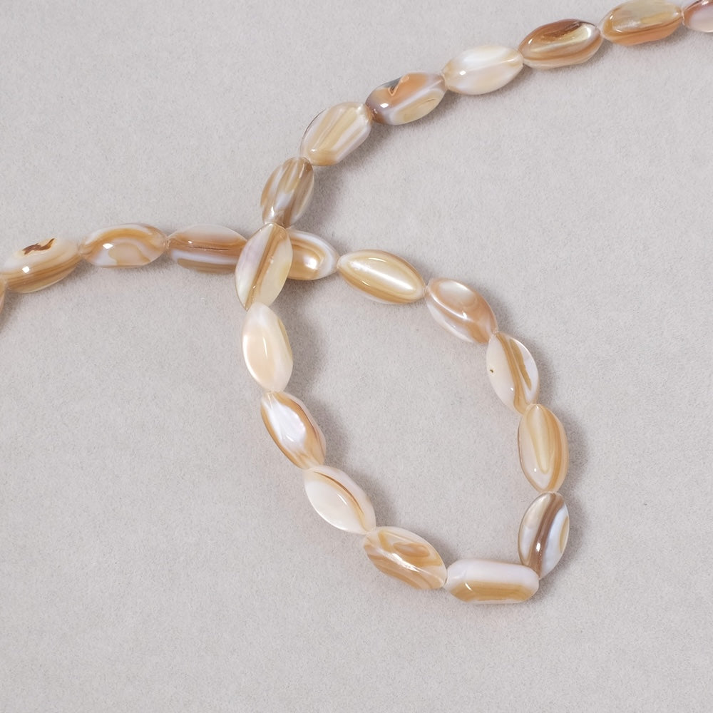 10 perles ovales en Nacre naturelle beige