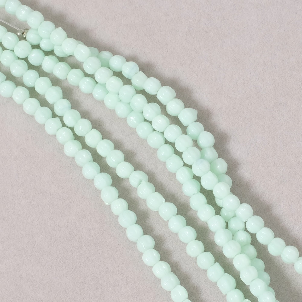 Fil de perles de Bohème rondes striées 3mm vert menthe opaque