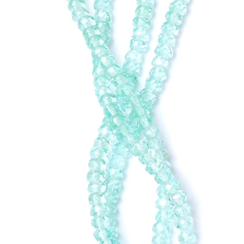 Fil de perles de Bohème facettées vert aqua transparent 2x4mm