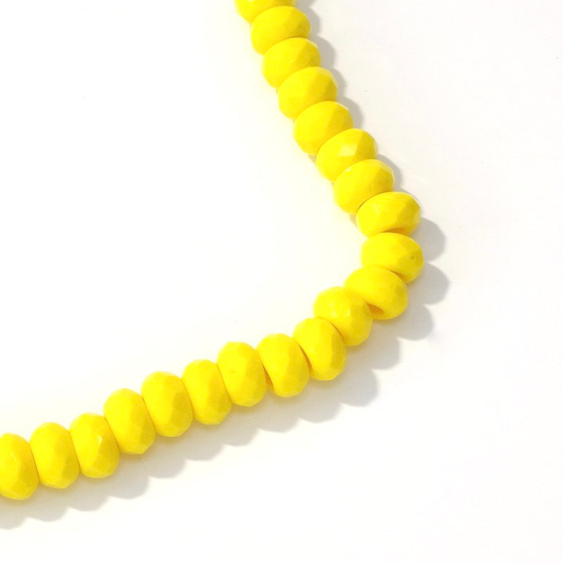 Fil de perles de Bohème Donuts Jaune opaque 9x5mm